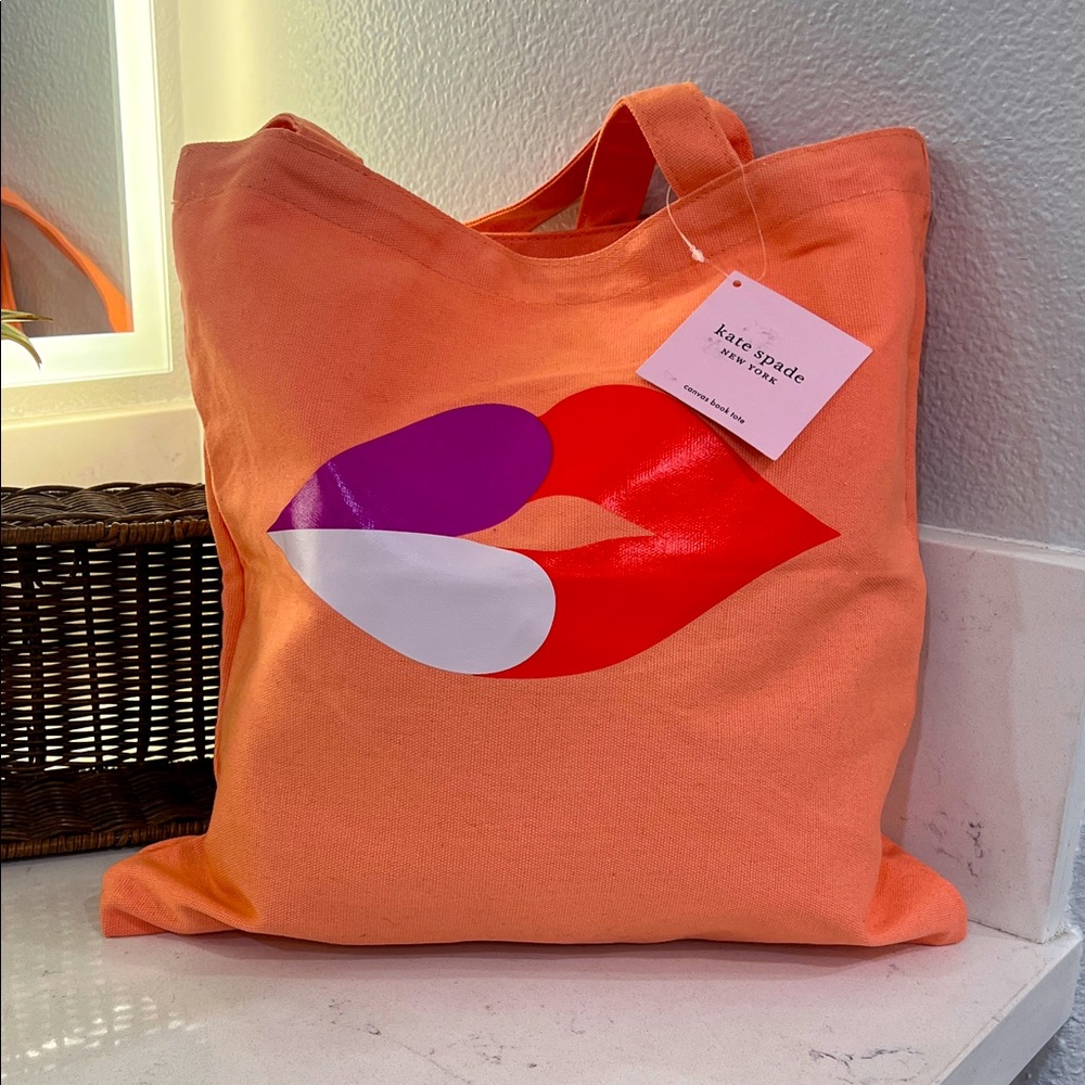 Kate Spade Peach Tote with Red and Purple Lip $ heart Design. NWT